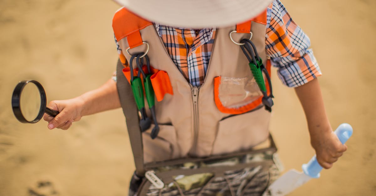 What counts as a bag and what counts as a vest? - Boy Wearing Brown and Orange Jacket What counts as a bag and what counts as a vest? - Boy Wearing Brown and Orange Jacket