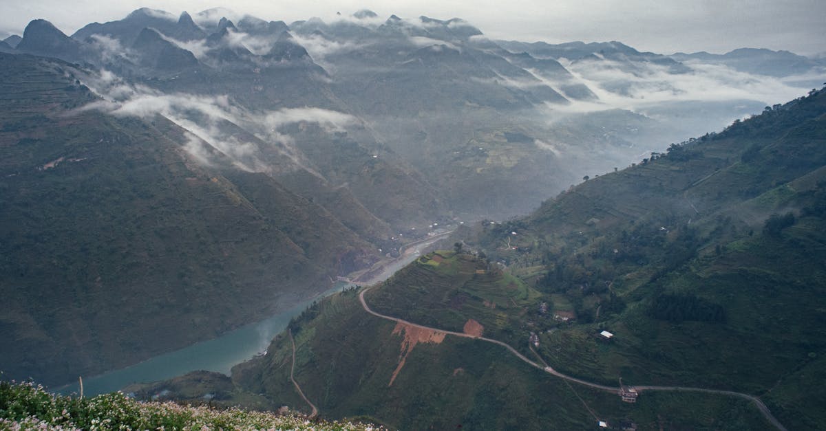 What counts as a tributary valley in Davos? - River Running Along Misty Valley in Mountains What counts as a tributary valley in Davos? - River Running Along Misty Valley in Mountains