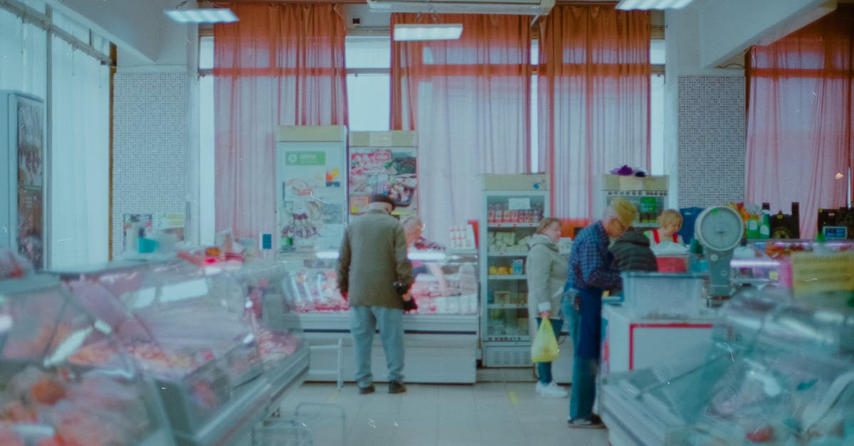 What do check-in counters know about travelers? - Small Group of People Doing Shopping in Local Store What do check-in counters know about travelers? - Small Group of People Doing Shopping in Local Store