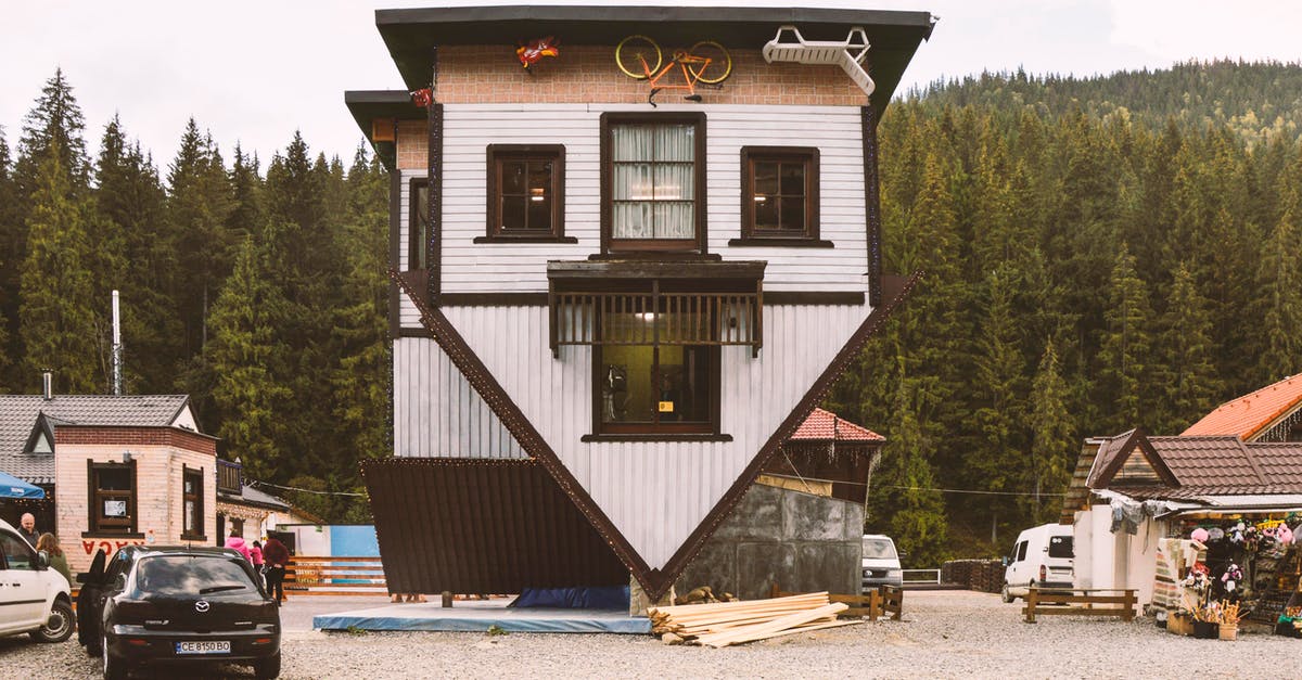 What do check-in counters know about travelers? - White and Brown Wooden House Near Green Trees What do check-in counters know about travelers? - White and Brown Wooden House Near Green Trees