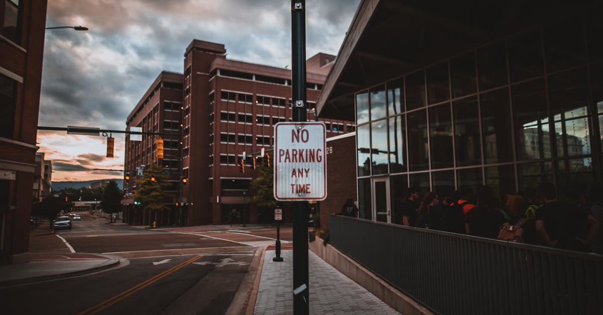 What do these warning/restriction codes in air tickets mean? - Signboard with NO PARKING inscription near city road What do these warning/restriction codes in air tickets mean? - Signboard with NO PARKING inscription near city road