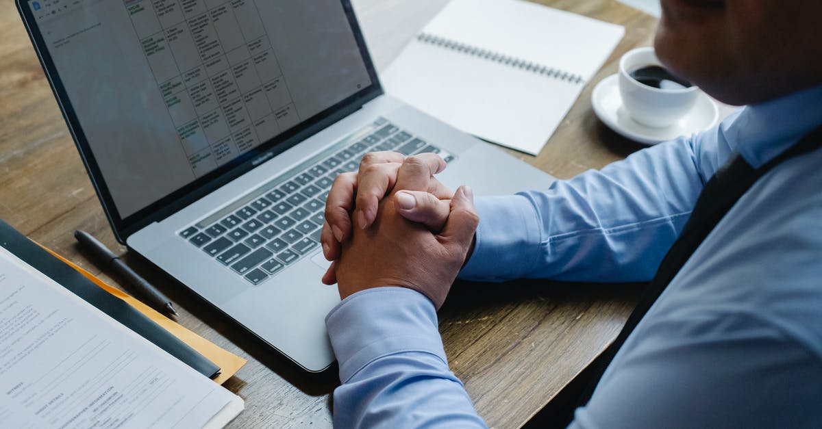 What document can I use to fly from US to Mexico? - Crop businessman working on laptop in contemporary workplace What document can I use to fly from US to Mexico? - Crop businessman working on laptop in contemporary workplace