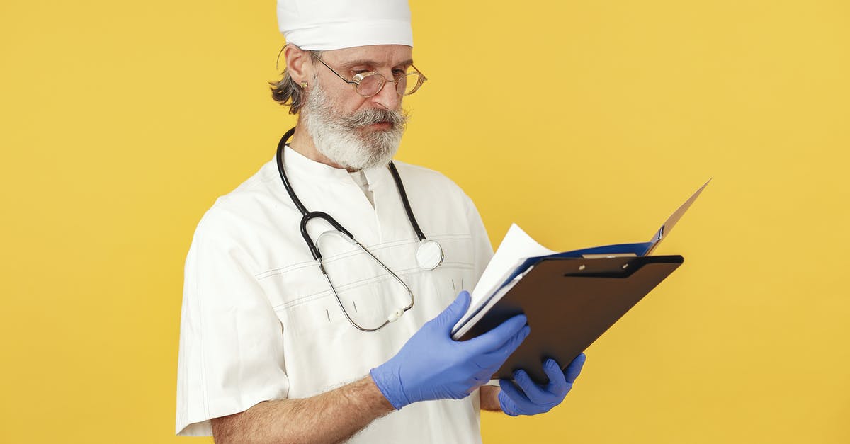 What documents are required to enter the Czech Republic for medical treatment? - Man in White Chef Uniform Holding Black Tablet Computer What documents are required to enter the Czech Republic for medical treatment? - Man in White Chef Uniform Holding Black Tablet Computer