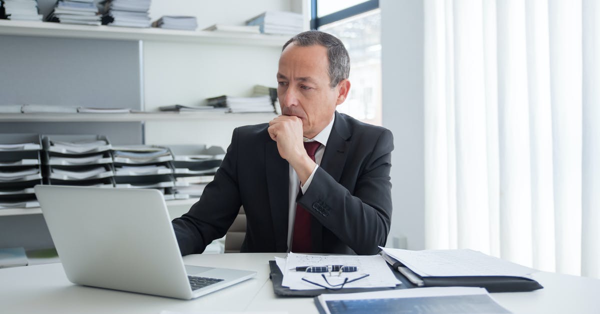 What documents should I submit after refusal of a visit visa? - Pensive Man Sitting Behind His Desk Using Laptop What documents should I submit after refusal of a visit visa? - Pensive Man Sitting Behind His Desk Using Laptop
