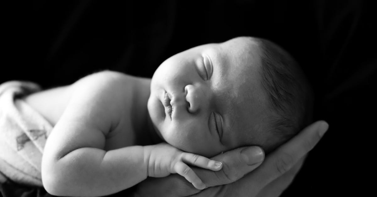 What does a Newborn baby need for a USA visa application? - Grayscale Photo of Baby Sleeping What does a Newborn baby need for a USA visa application? - Grayscale Photo of Baby Sleeping