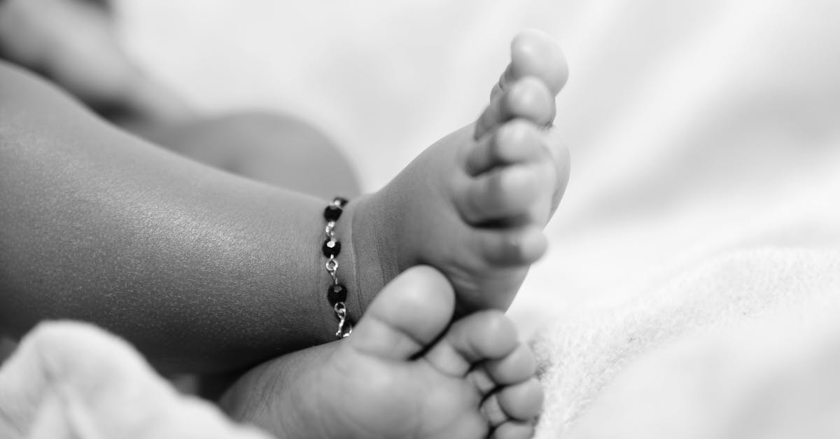 What does a Newborn baby need for a USA visa application? - Grayscale Photo of Babys Feet What does a Newborn baby need for a USA visa application? - Grayscale Photo of Babys Feet