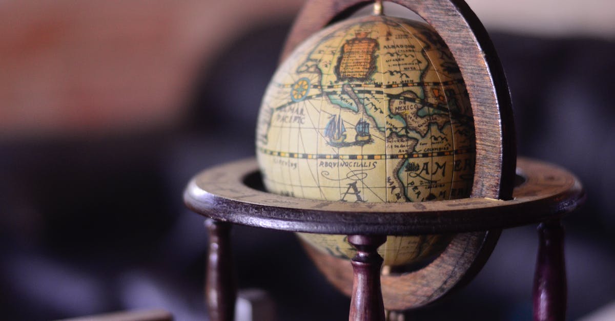 What does a surcharge for departure dates mean for an round the world ticket? - Shallow Focus Photography of Brown Globe What does a surcharge for departure dates mean for an round the world ticket? - Shallow Focus Photography of Brown Globe