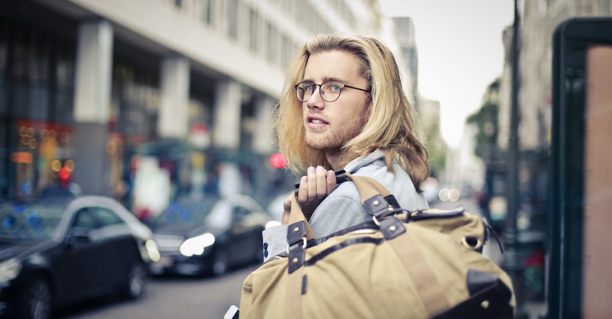 What does "hold bag" mean when traveling with easyJet? - Man Holding His Duffel Bag What does "hold bag" mean when traveling with easyJet? - Man Holding His Duffel Bag