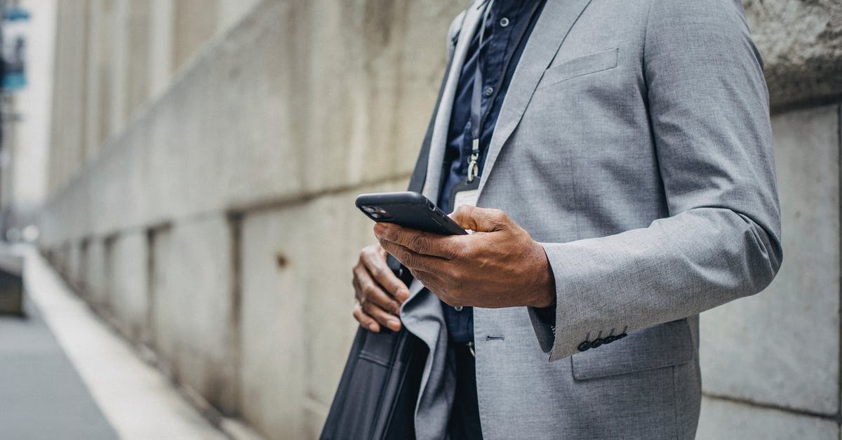 What does the "DS" in "DS-..." US visa application forms stand for? - Crop unrecognizable African American male in formal suit standing on street and browsing modern mobile phone What does the "DS" in "DS-..." US visa application forms stand for? - Crop unrecognizable African American male in formal suit standing on street and browsing modern mobile phone