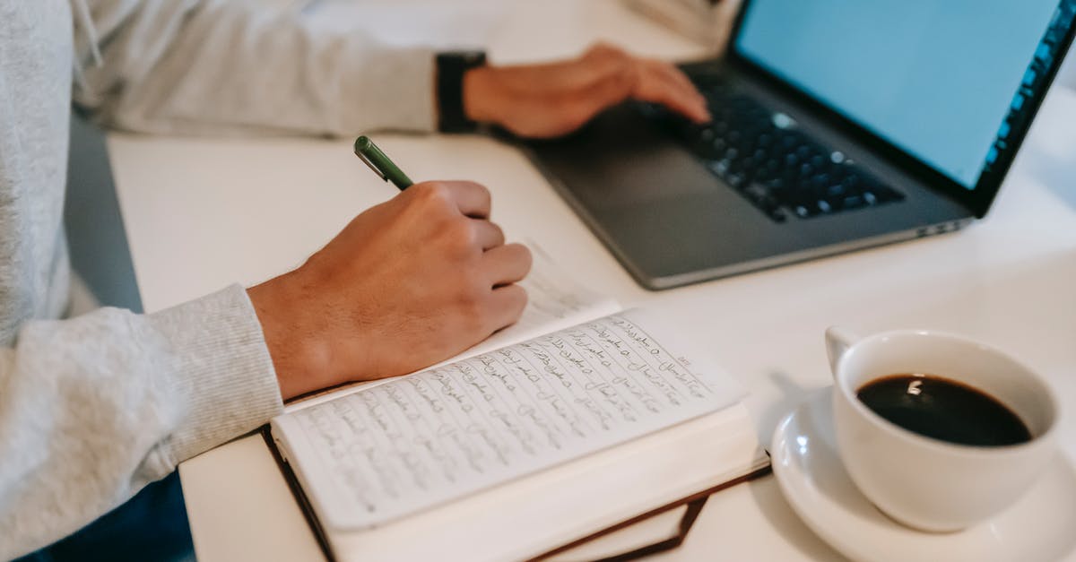 What does the term "benefit" in independent research category, under B-1 visa, imply? - Freelancer browsing laptop and taking notes in notebook during work What does the term "benefit" in independent research category, under B-1 visa, imply? - Freelancer browsing laptop and taking notes in notebook during work