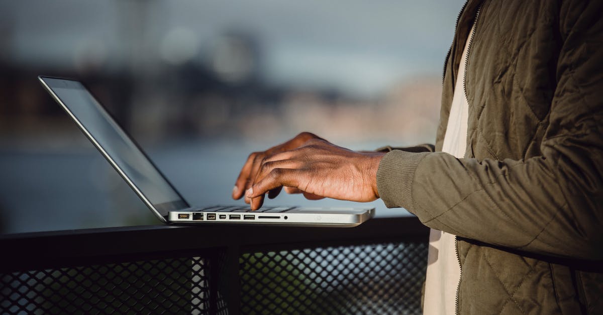 What does the term "benefit" in independent research category, under B-1 visa, imply? - Crop man working on laptop on open terrace What does the term "benefit" in independent research category, under B-1 visa, imply? - Crop man working on laptop on open terrace