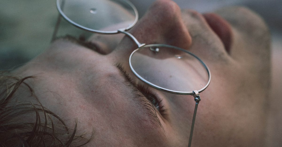 What does the UK immigration form IS 116 look like? - Closeup of crop young male in eyewear with pure water drips looking up on blurred background What does the UK immigration form IS 116 look like? - Closeup of crop young male in eyewear with pure water drips looking up on blurred background