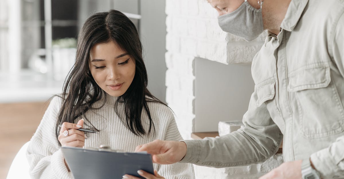 What does the UK immigration form IS 116 look like? - A Woman Signing a Receiving Form Paper What does the UK immigration form IS 116 look like? - A Woman Signing a Receiving Form Paper