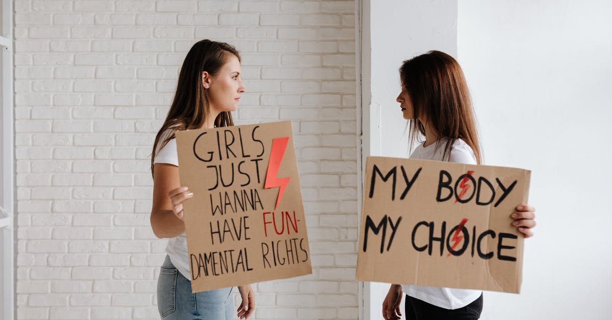 What does this placard mean on some Vienna's buildings? - Free stock photo of activism, adult, advertising What does this placard mean on some Vienna's buildings? - Free stock photo of activism, adult, advertising