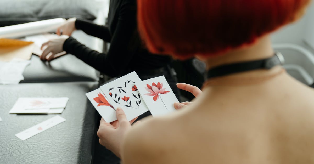 What does this sticker on the back of my passport mean? - 2 of Diamonds Playing Card