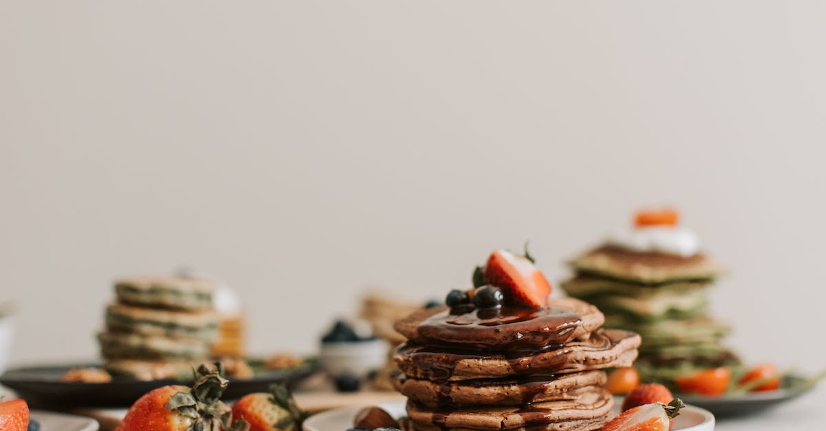 What foods must I try while visiting Australia? [closed] - Close-Up Shot of Delicious Pancakes with Berries on Top