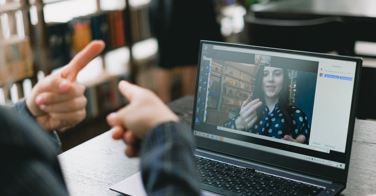 What foreign language is the most common in Serbia? - Young lady learning sign language during online lesson with female tutor What foreign language is the most common in Serbia? - Young lady learning sign language during online lesson with female tutor