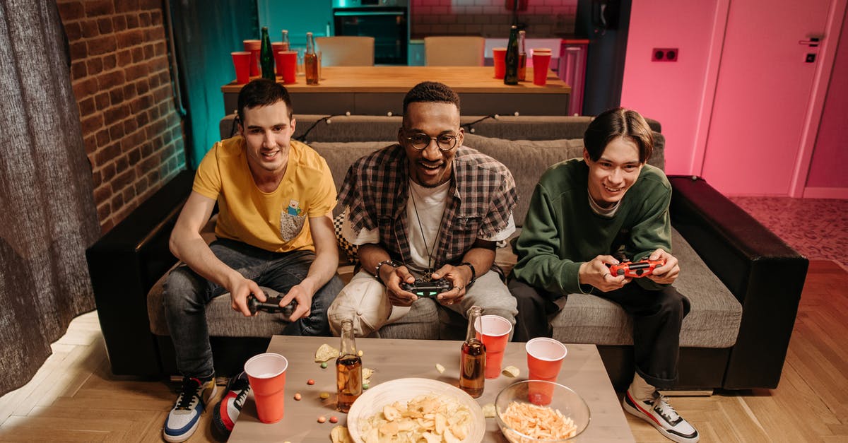 What games can I play with friends in the confined space of the seating on a long flight? [closed] - Free stock photo of adult, beer, child