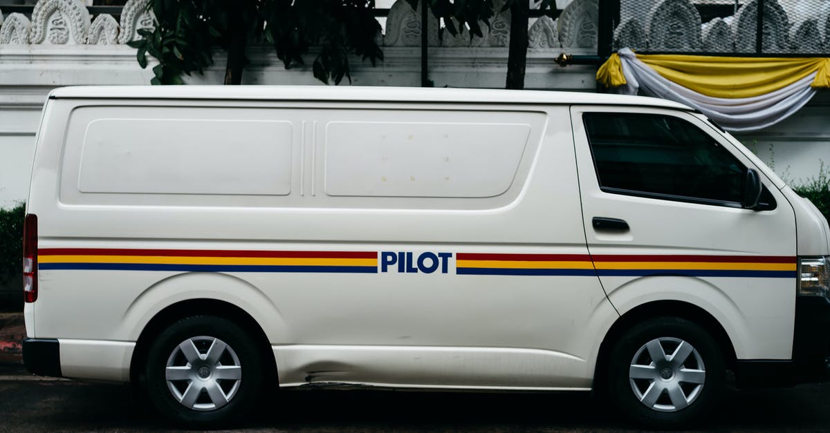 What happens if police stops me when driving a rental car and I'm not the authorized driver (US-FL)? - White and Blue Van on Road