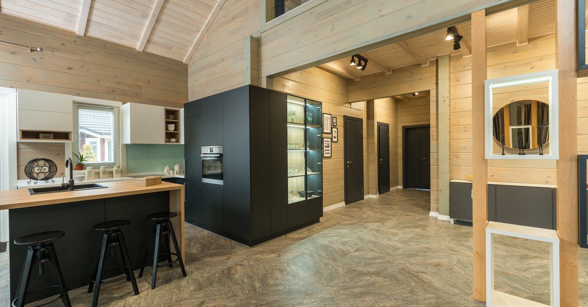 What happens if you are refused entry between two countries? - Spacious hallway leading to modern kitchen in minimalist styled house What happens if you are refused entry between two countries? - Spacious hallway leading to modern kitchen in minimalist styled house