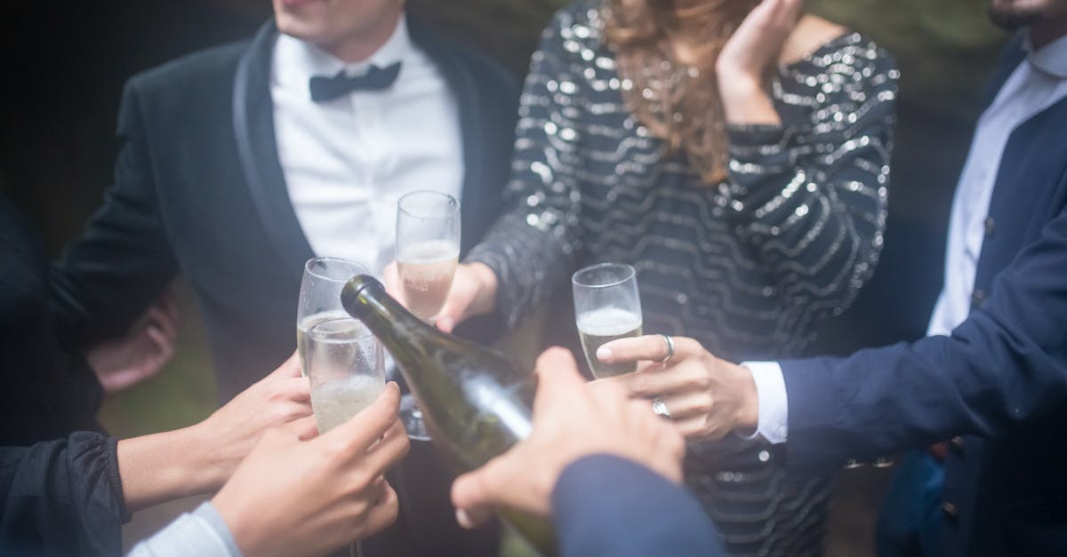 What happens when you exceed the import limits of alcohol in Norway? - Man in Black Suit Jacket Holding Clear Glass Bottle What happens when you exceed the import limits of alcohol in Norway? - Man in Black Suit Jacket Holding Clear Glass Bottle