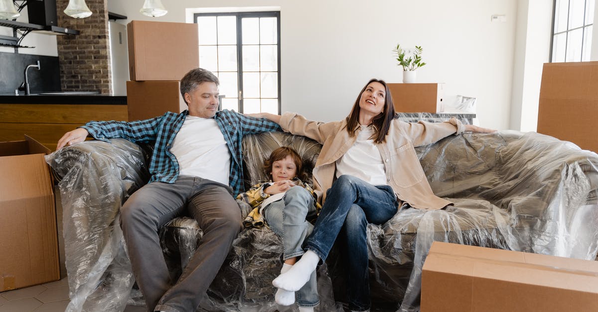 What ID is needed for minors traveling with parents inside Mexico? - Happy Family Sitting on a Couch What ID is needed for minors traveling with parents inside Mexico? - Happy Family Sitting on a Couch