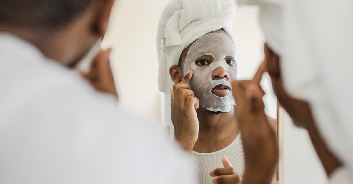 What is a 'sparrow bath' and how do you do it in airport bathroom? - Men Looking in Mirror Doing Facial Procedures What is a 'sparrow bath' and how do you do it in airport bathroom? - Men Looking in Mirror Doing Facial Procedures