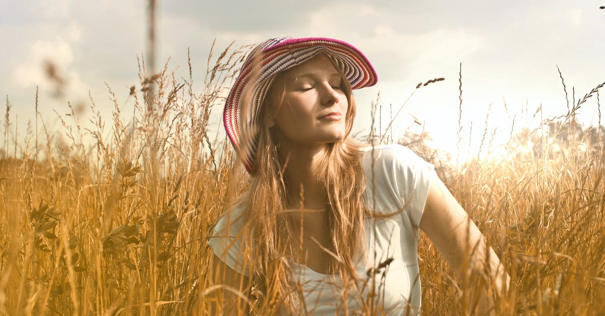 What is a good country for a working vacation? [closed] - Woman Wearing White Top and Red and White Sunny Hat