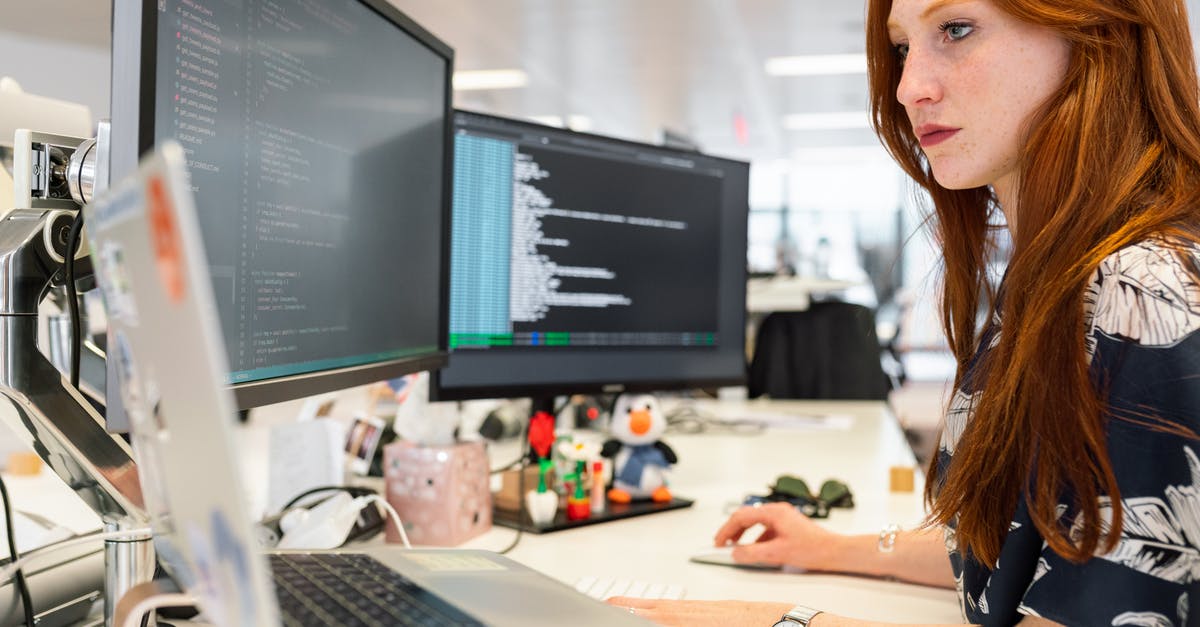 What is an International Driver's License? - Woman Coding on Computer What is an International Driver's License? - Woman Coding on Computer