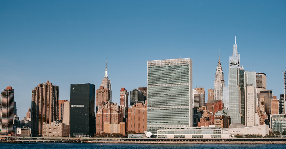 What is considered impolite in Central/South American area - Modern city with skyscrapers and residential buildings located near river