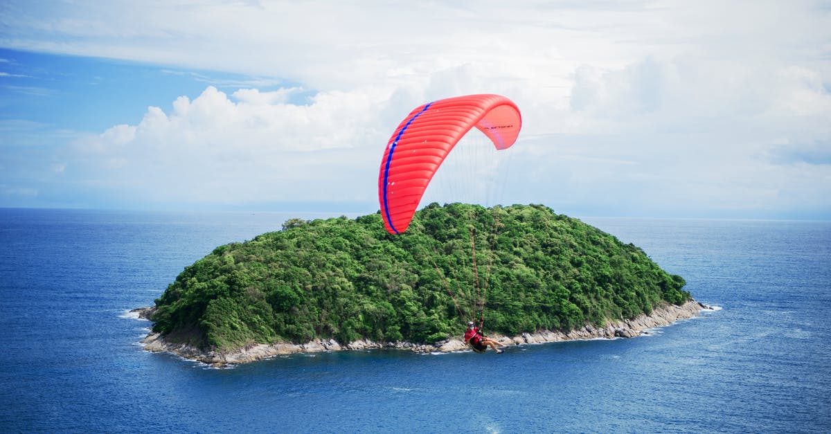 What is considered to be Phuket center? - Person Riding Parachute What is considered to be Phuket center? - Person Riding Parachute