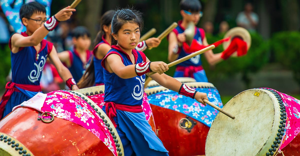 What is France's traditional costume? - People Playing Drum What is France's traditional costume? - People Playing Drum