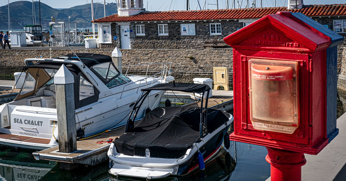 What is my port of entry into India? - Blue and White Boat on Dock What is my port of entry into India? - Blue and White Boat on Dock