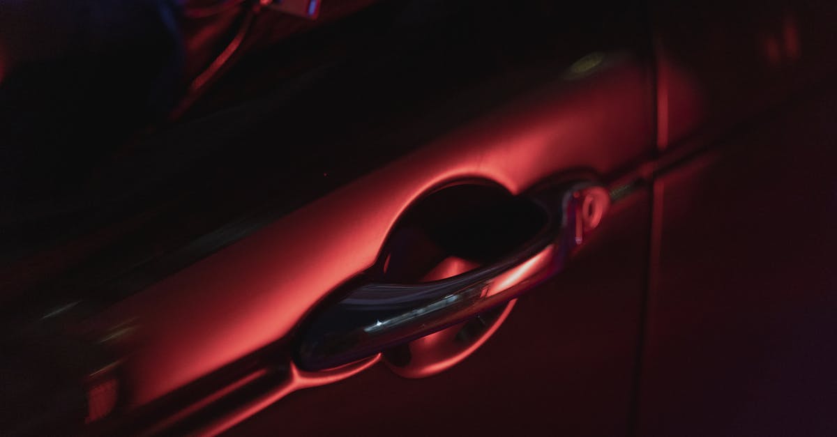 What is the cheapest mode of transportation to DCA for a 6AM flight? [closed] - Red and Black Car Door
