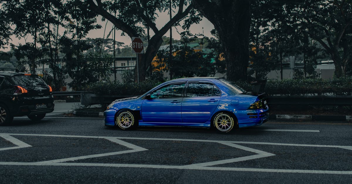 What is the cheapest way of travelling between New York and Las Vegas by public transportation? [closed] - Modern blue car on asphalt road