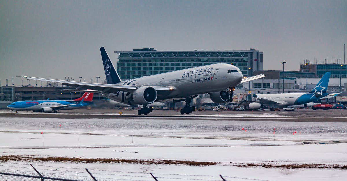 What is the fastest speed a passenger airplane flies at? - Aircraft flying over runway near airport building What is the fastest speed a passenger airplane flies at? - Aircraft flying over runway near airport building
