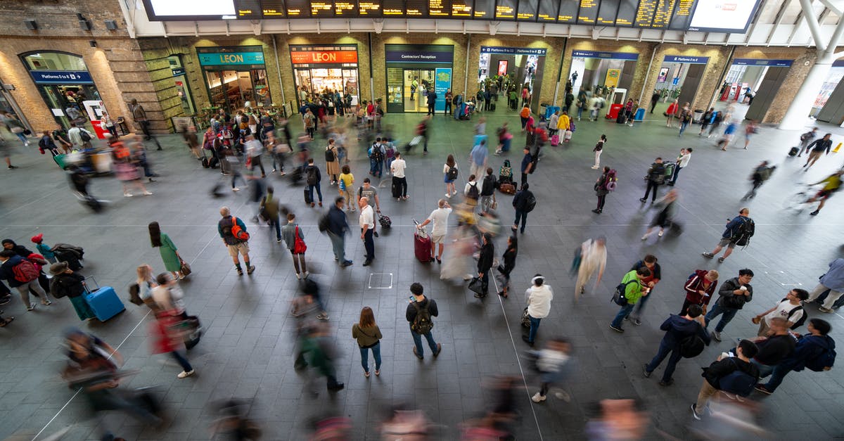 What is the function of UK Border Force agents at UK airports between departures security and the shops? - Crowd passengers at rail station