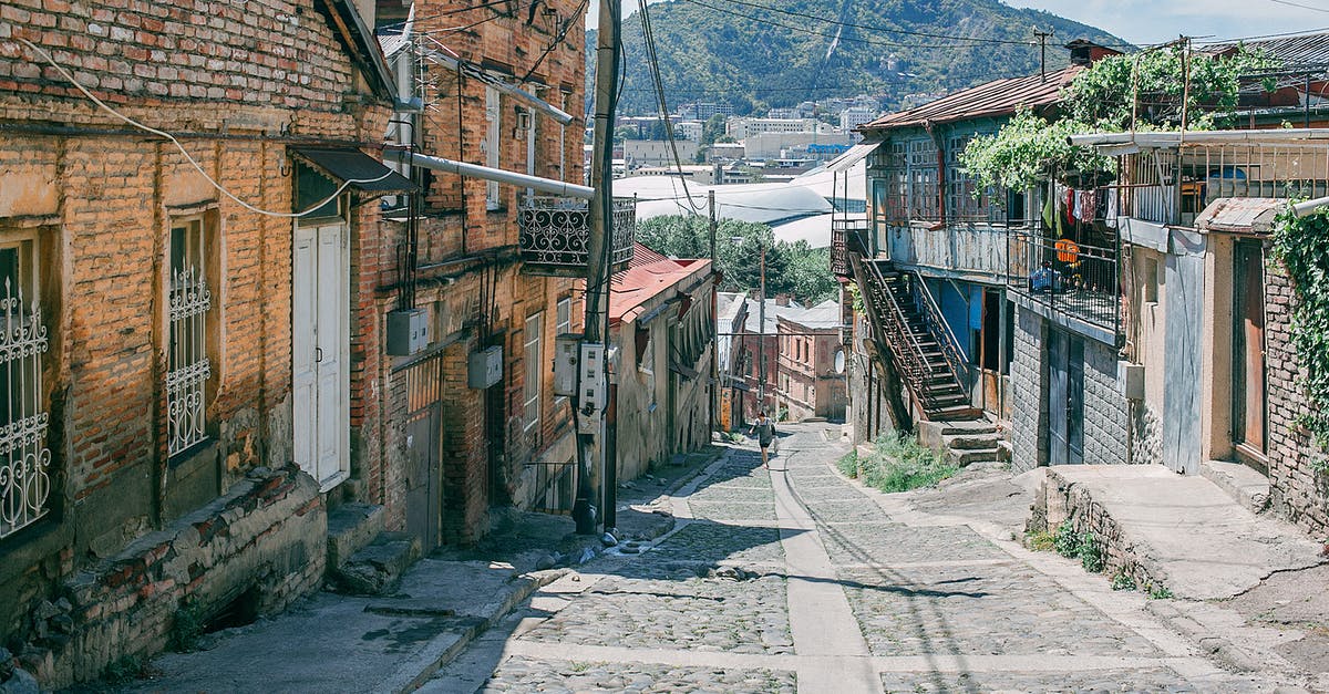 What is the highest altitude town or village with accommodation in Cambodia? - Narrow paved road in town What is the highest altitude town or village with accommodation in Cambodia? - Narrow paved road in town
