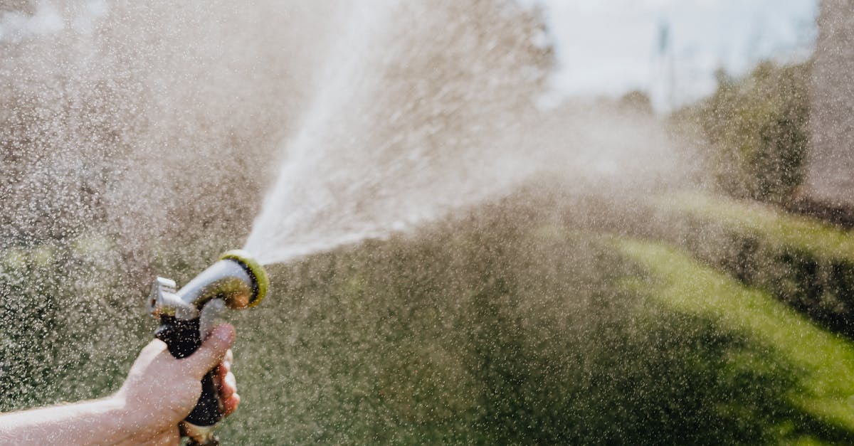 What is the intended use of the water hose in Indian restrooms? [duplicate] - Close-Up Photo of Water Coming out of a Spray Hose