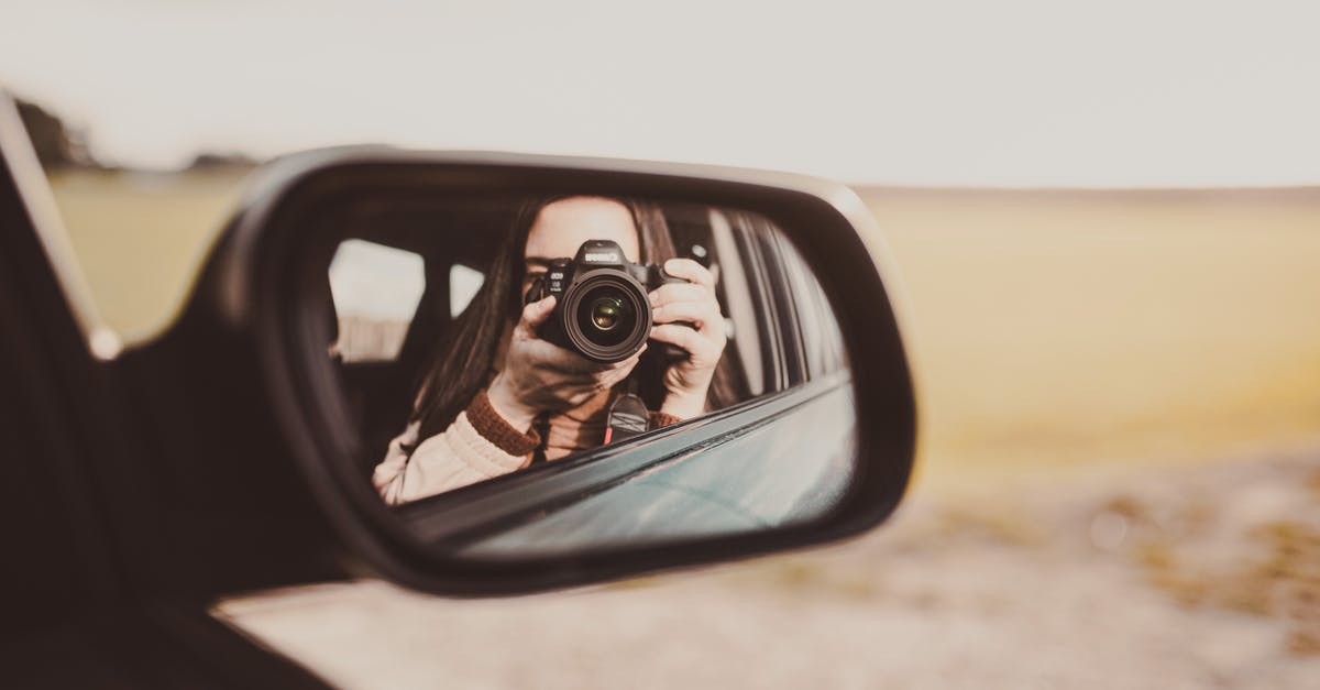 What is the location of photo used for Windows 10 lock screen? [duplicate] - Unrecognizable female photographer taking photos and reflecting in rear window