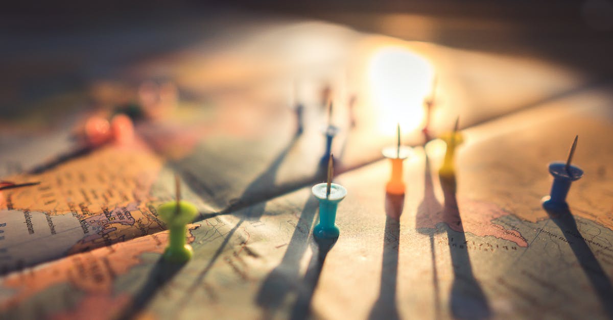 What is the location of this performance? - Close-Up Photo of Assorted Color of Push Pins on Map What is the location of this performance? - Close-Up Photo of Assorted Color of Push Pins on Map