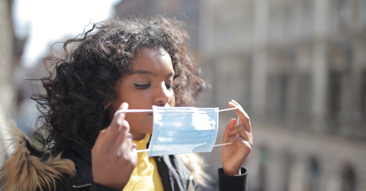 What is the most isolated building in the world? - Serious young ethnic lady putting on medical mask on street What is the most isolated building in the world? - Serious young ethnic lady putting on medical mask on street