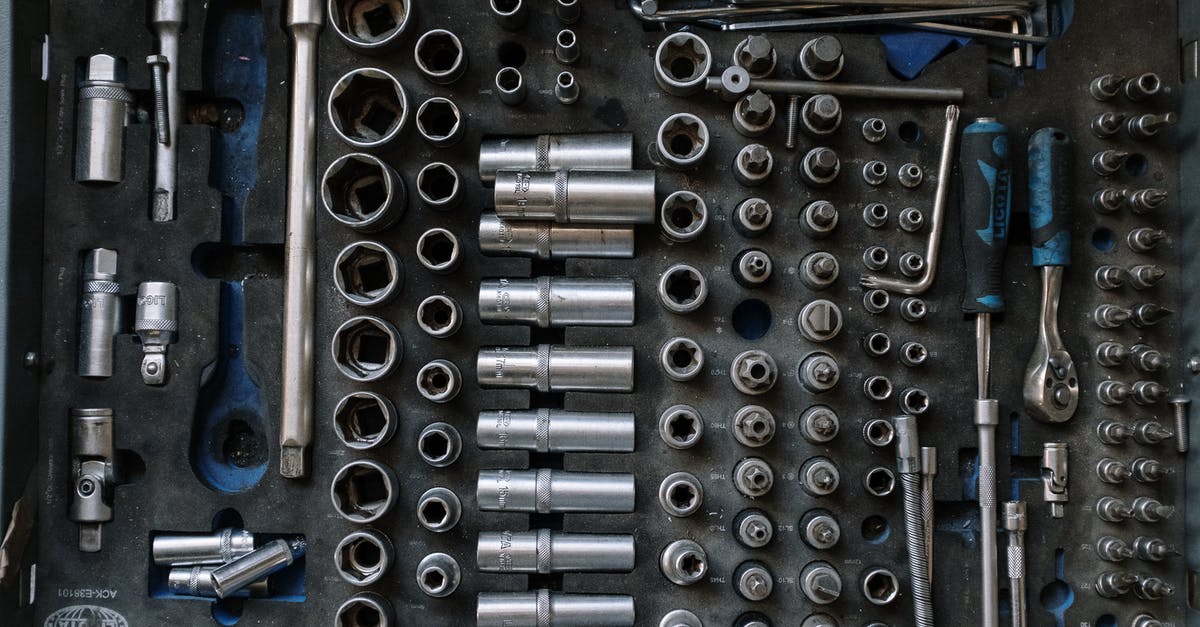 What is the proper tool to unscrew this type of screw? [closed] - Silver and Blue Metal Tools