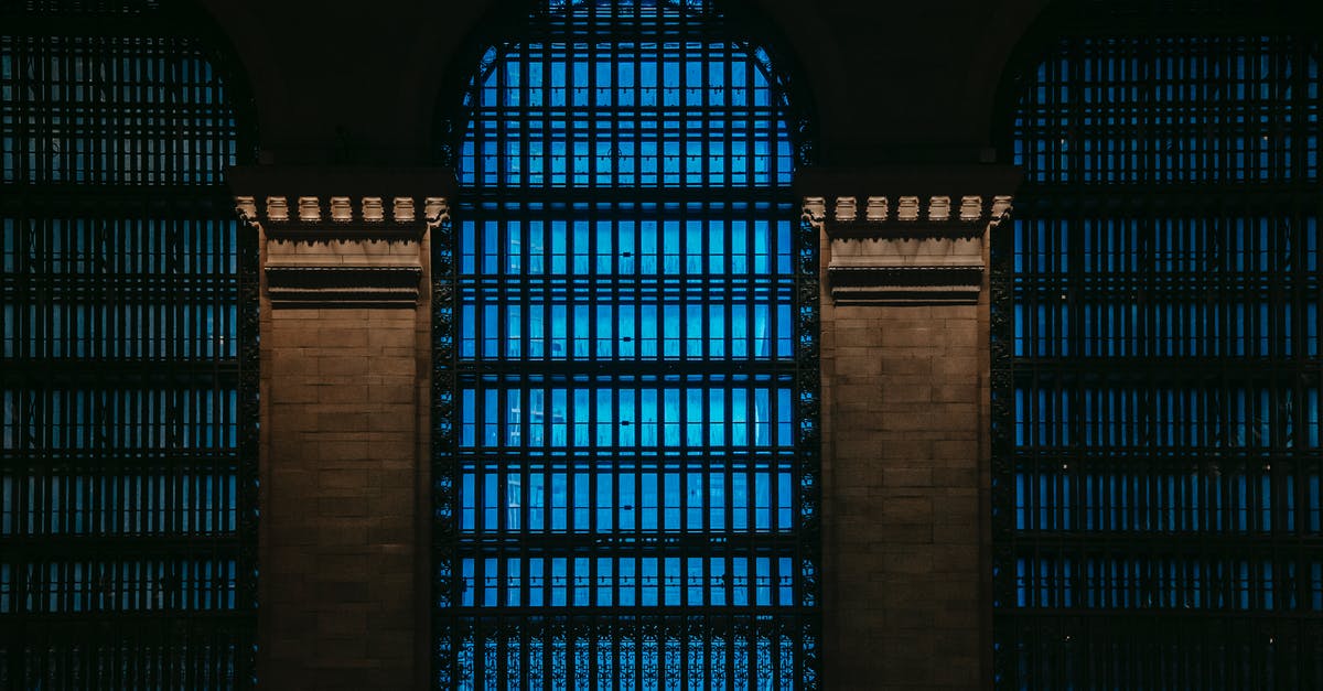 What is the quietest place with some industry? [closed] - Building exterior with high blue windows with bars