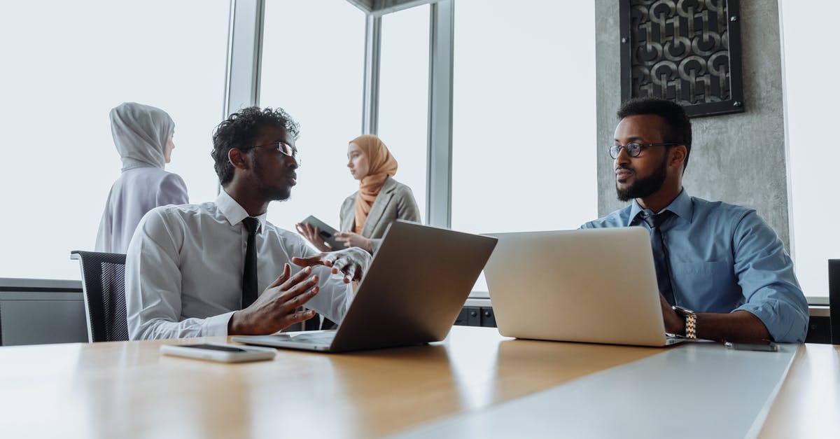 What is the reason to not allow smartphones and laptops in checked baggage? - Coworkers in a Meeting What is the reason to not allow smartphones and laptops in checked baggage? - Coworkers in a Meeting