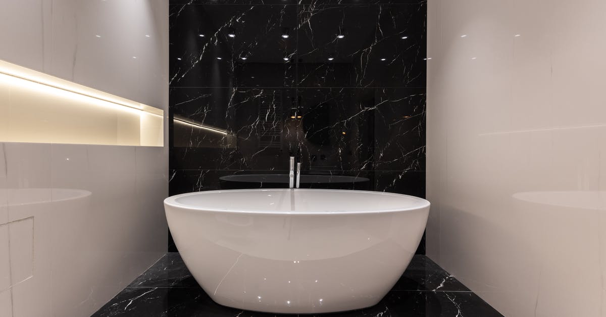 What is the red light in the hotel bath for? - Interior of modern bathroom in apartment What is the red light in the hotel bath for? - Interior of modern bathroom in apartment