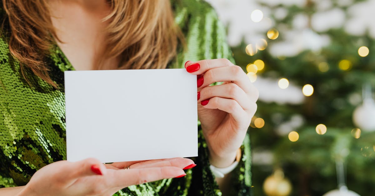 What is the standard UK SIM card size? - Woman in Green Long Sleeve Shirt Holding White Paper What is the standard UK SIM card size? - Woman in Green Long Sleeve Shirt Holding White Paper
