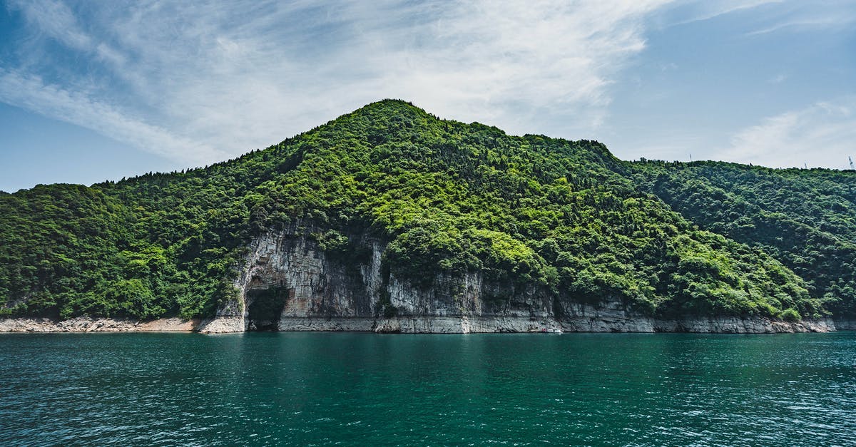 What is this island in the South China Sea called? - Landscape Photo of Mountain Covered With Trees What is this island in the South China Sea called? - Landscape Photo of Mountain Covered With Trees