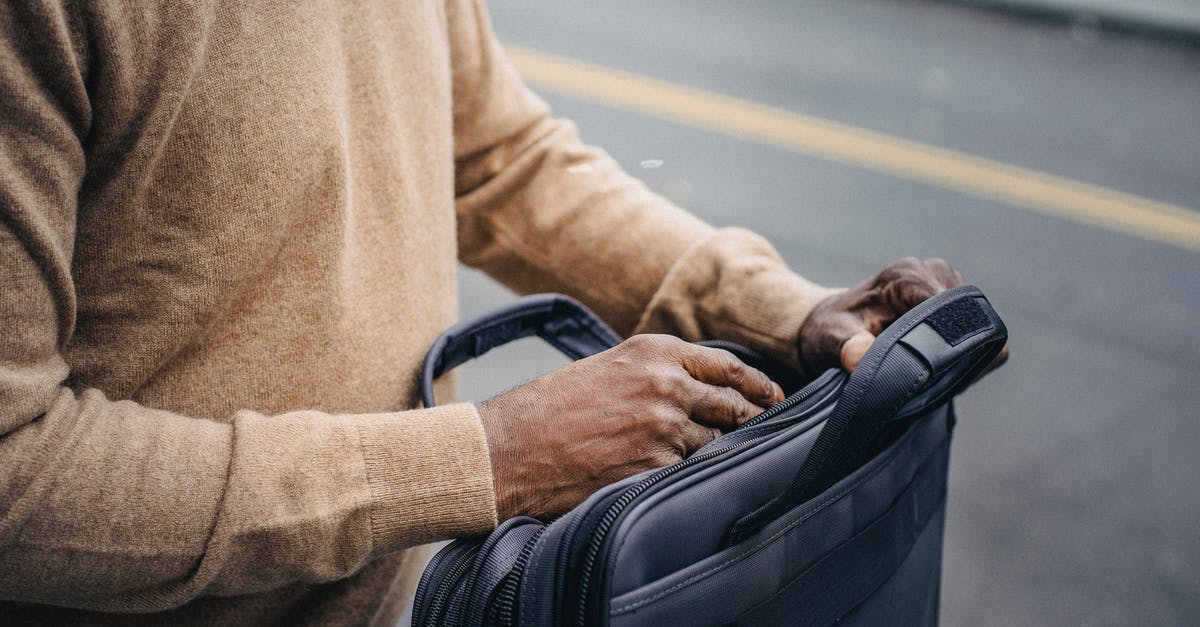 What is Two-Way Open Jaw? - Crop black man with briefcase What is Two-Way Open Jaw? - Crop black man with briefcase