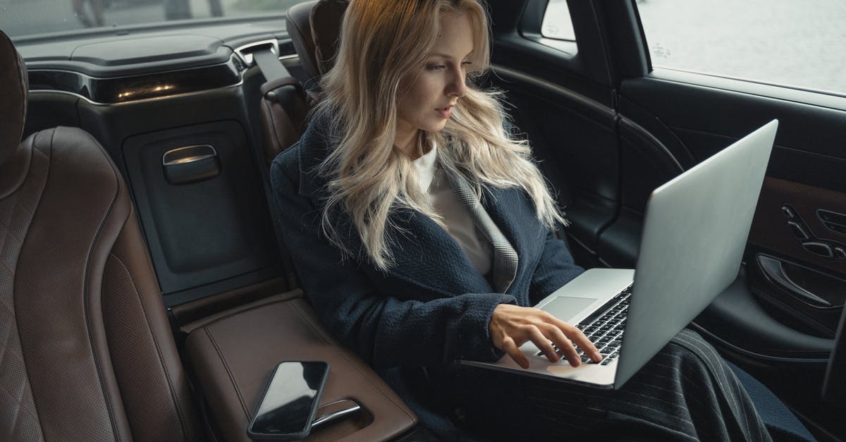 What kind of bag can I use to travel with a baby car seat? - Woman in Blue Coat Sitting on Car Seat What kind of bag can I use to travel with a baby car seat? - Woman in Blue Coat Sitting on Car Seat